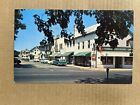 Postcard Lewes DE Delaware Downtown Soda Fountain Candy Old Cars Vintage PC