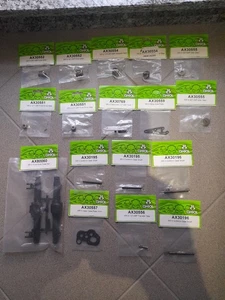 Axial XR-10 Lotto Ricambi Nuovi Scaler Crawler M.o.a. 17 Parti Nuove In Busta  - Foto 1 di 8