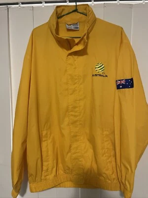 Chaqueta cortavientos Socceroos para hombre talla L cremallera completa amarilla con capucha manga larga A067 Foto 1 de 4
