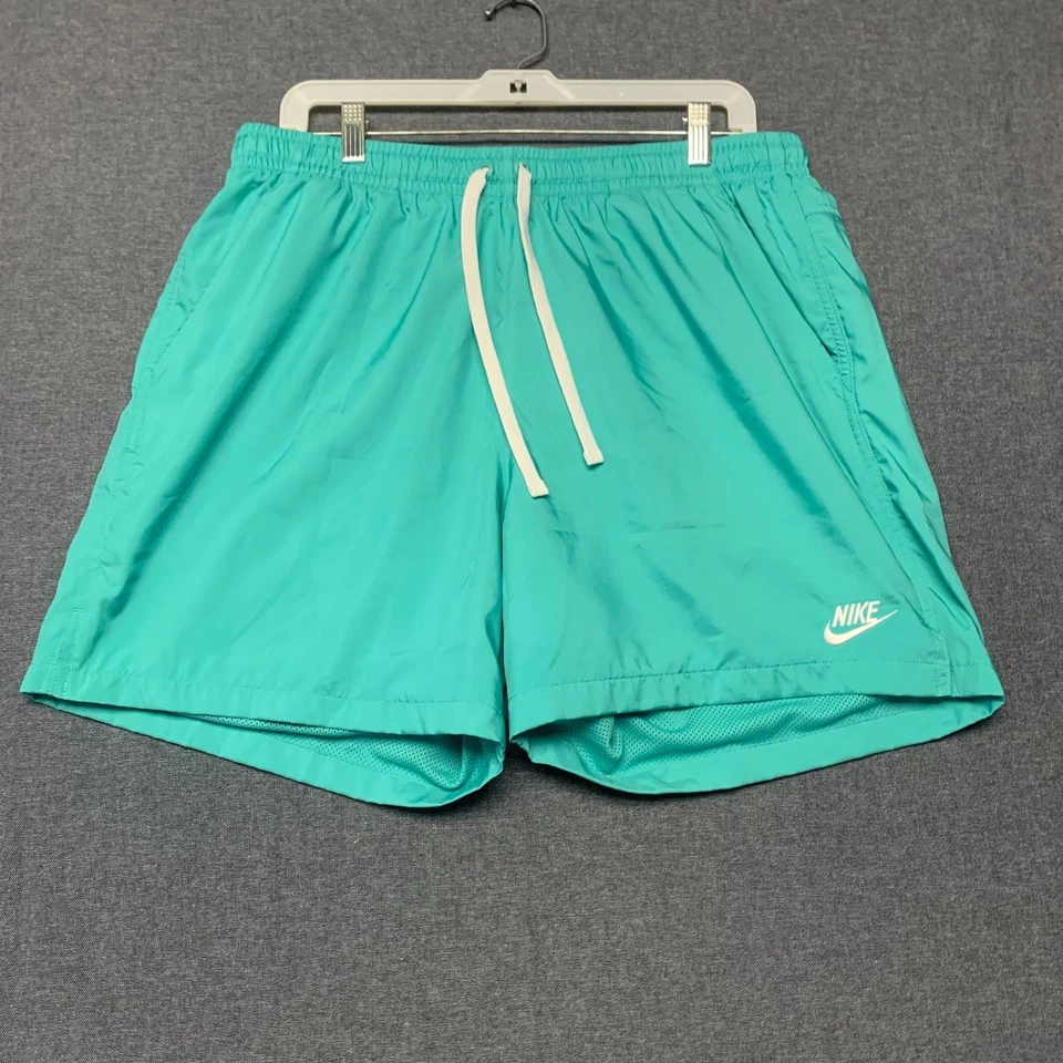Pantalones cortos de natación forrados de malla con cordón verde azulado talla XL de secado rápido Nike para hombre Foto 1 de 4