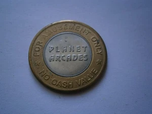 Planet Arcades Game Token | No cash Value | For Amusement Only - Free Postage!! - Bild 1 von 2