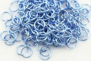 Lot de 50 anneaux aluminium bleu clair de 0.6 cm / 6 mm - création de bijoux. - Picture 1 of 3