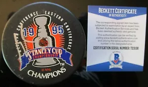 MARTIN BRODEUR SIGNED NEW JERSEY DEVILS 1995 CHAMPS PUCK BECKETT BAS COA T23136 - Picture 1 of 2