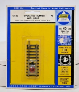 HO TRAINS VINTAGE AHM #2526 BRASS BUMPER W/LIGHT - CARDED- NEW- S32 - Picture 1 of 3