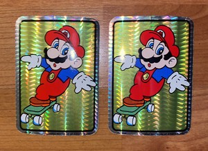 2 1990 VINTAGE NINTENDO Skateboarding SUPER MARIO BRO Sticker GAME PRISM VENDING