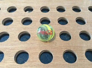 Vintage | Coca-Cola | Yellow Swirl | Glass Marble | 1991 - Picture 1 of 4