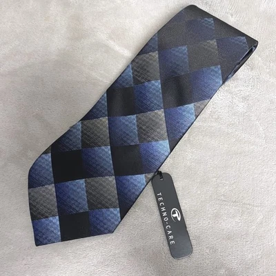 Corbata de seda Birmania Bibas Techno-Care para hombre negra azul gris geométrica Foto 1 de 4