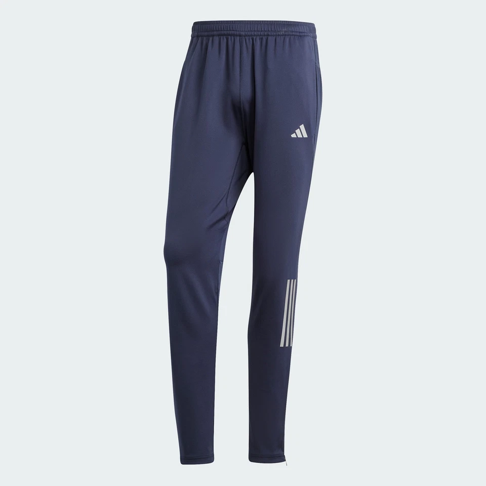 Pantalones de punto Adidas Own the Run Astro para hombre Foto 1 de 2