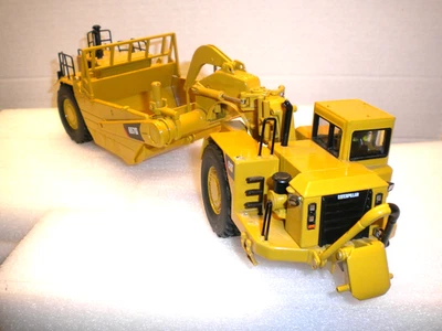 Rascador tractor rueda CAT 657 G dañado barandilla 1/50 por diecast masters 85175 C Foto 1 de 4