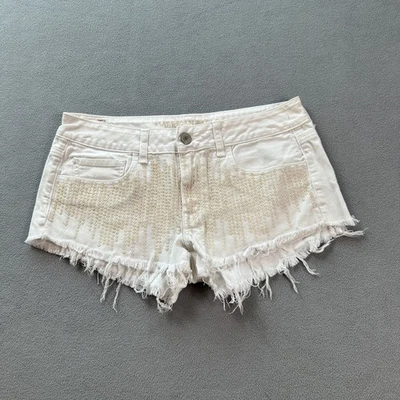 Pantalones cortos de mezclilla American Eagle para mujer 8 flecos de lentejuelas blancos adornados deshilachados Foto 1 de 4