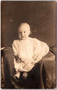 Baby Girl White Long Dress Sitting On Couch Real Photo RPPC Postcard - Picture 1 of 2