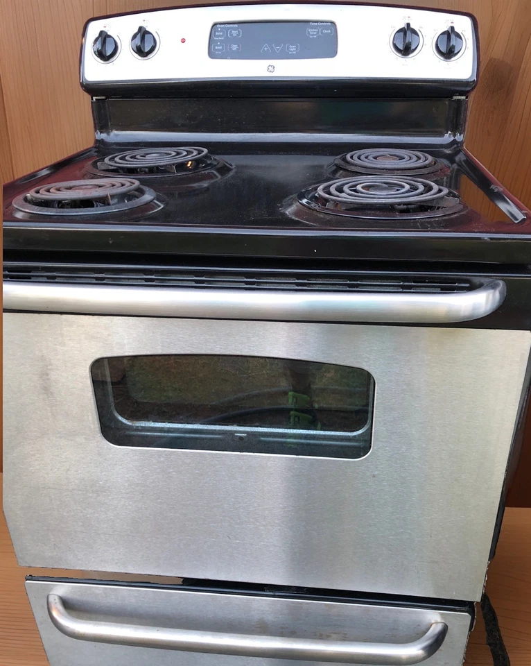 Estufa de cocina GE de acero inoxidable negra independiente 4 quemadores ⚡️Bobina para asar JB256DMW Foto 1 de 4