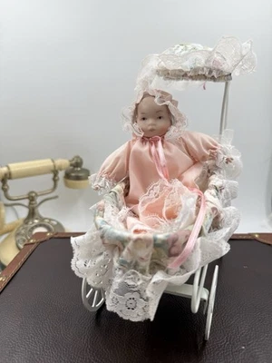 VTG Victorian Style Porcelain Doll And Sleigh Baby Doll Carriage Buggy - Image 1 of 4