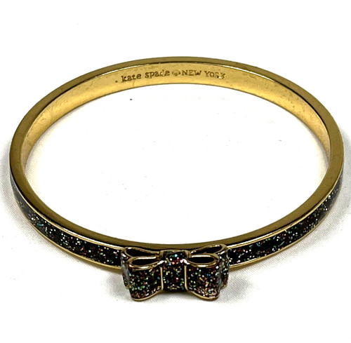 Bracciale Kate Spade con fiocco glitter tono oro colorato