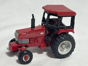 ERTL 1/64 White American 60 Row Crop Red Farm Toy Tractor - Picture 1 of 2