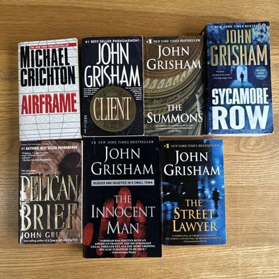 Lot of 7 John Grisham Paperback Books - Random - Image 1 of 4
