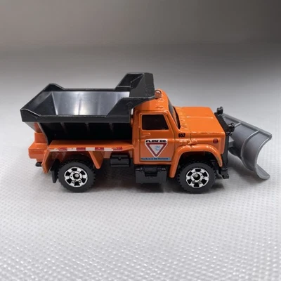 Camión de volteo quitanieves Matchbox 1990 escala 1:83 naranja mantenimiento carretera Foto 1 de 4