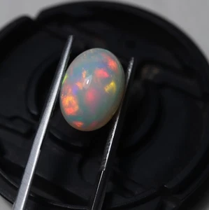 10x14 MM Oval 4.6 Cts Natural AAA Red Green Ethiopian Opal Cabochon For Jewelry - Picture 1 of 10