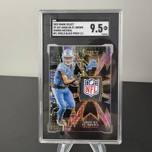 Amon-Ra St. Brown 2023 Select Sparks Material NFL Shield Black Prizm 1/1 SGC 9.5 - Picture 1 of 2