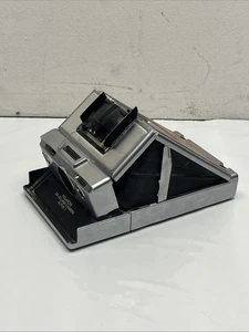 Appareil photo ancien Polaroid SX-70 marron argent instantané terre pour pièces ou réparation - Photo 1/8