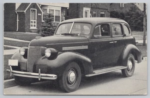 Postcard Vintage the 1937 Dodge D5 Sedan Automobile - Picture 1 of 2