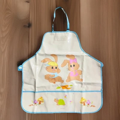 Babero vintage PECOWARE bebé niño conejito conejos unisex grande con bolsillos de goteo 1986 Foto 1 de 4