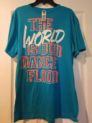 Nueva Camiseta Unisex Zumba Wear EL MUNDO ES NUESTRA PISTA DE BAILE Aqua Talla Única Foto 1 de 3
