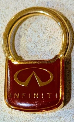 VINTAGE INFINITI PADLOCK STYLE KEYCHAIN GOLD TONE DAYTON OHIO - Image 1 of 2