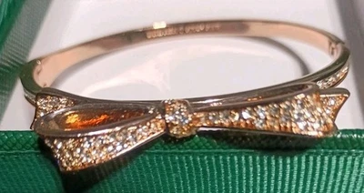 Kate Spade Love Notes Rose Gold Tone Pave Crystal Bow Hinged Bangle Bracelet - Image 1 of 4