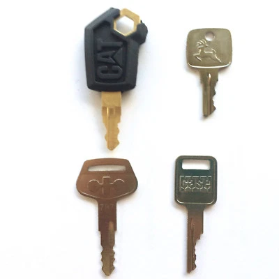 4 Pc Heavy Equipment Key Set - CAT John Deere Case Komatsu OEM Logos - Image 1 of 4