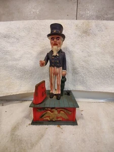 Vintage Plastic Uncle Sam Mechanical Coin Drop Bank  - Picture 1 of 5