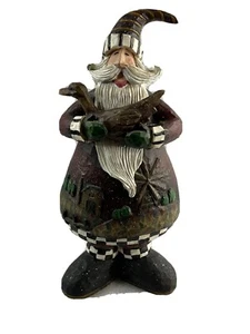 Weihnachtsmann hält eine Gans. - Bild 1 von 9