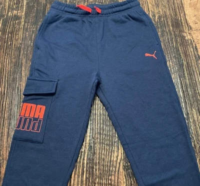 Pantalones deportivos PUMA KIDS azul marino profundo con bolsillo grande con logotipo talla M (10-12) algodón Foto 1 de 4