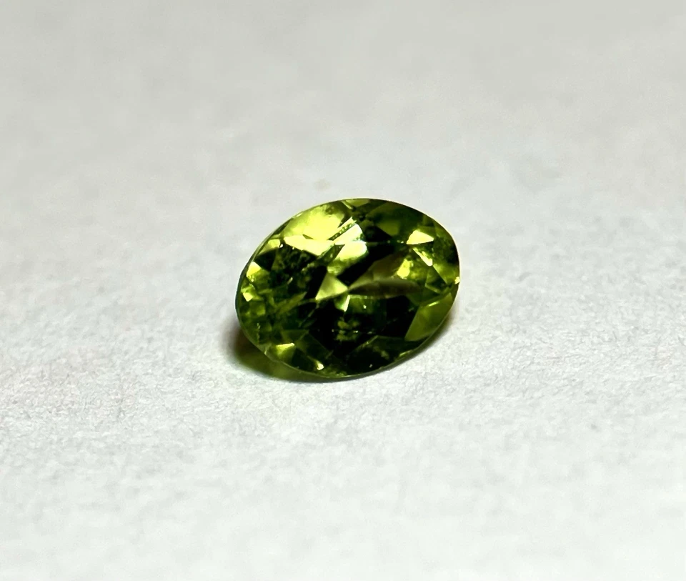 Real Ant Hill Peridot Gemstone With Very Large 7x5 MM Measurements! 0.88 CT - Image 1 of 3