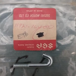NEW GENUINE SUZUKI 11921-16400, ENGINE PROTECTOR HOOK, 1969-1977 - Picture 1 of 2