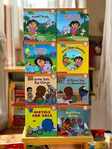 8 SCHOLASTIC Books 4 "Dora the Explorer" + 3 "Little Bill" + 1 "Oswald" - Picture 1 of 1