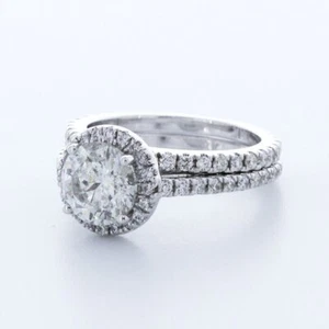 JUEGO DE ANILLOS HALO PIEDRAS LATERALES ORO BLANCO 18K CORTE REDONDO DIAMANTE NATURAL F/SI3 3,6 QUILATES - Imagen 1 de 4