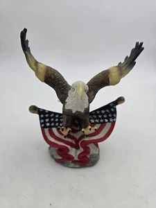 Bald Eagle Statue with American Flags   - Picture 1 of 8