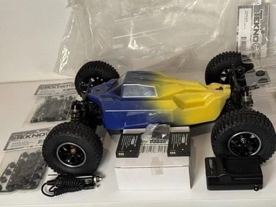 1/10 TEKNO 4WD Buggy + NEW KR6608 Body EB410 Cepek Mud Tires JConcepts & EXTRAS - Image 1 of 4