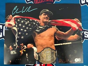 Chris Weidman Autographed American Flag on Shoulders 16x20 Photo (Beckett) - Picture 1 of 1