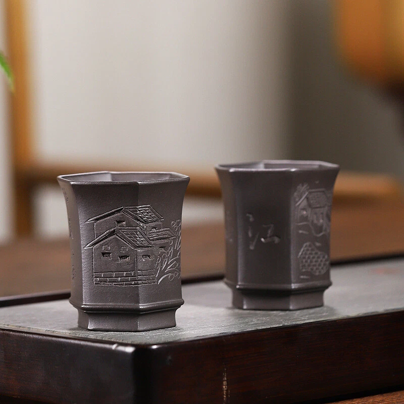 Taza de té real Yixing Zisha de una taza 100 ml patrón tallado a mano al azar taza maestra Foto 1 de 4