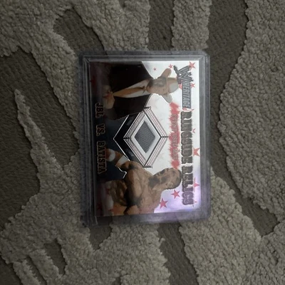 2005 TOPPS WWE HERITAGE JBL VS. BATISTA RINGSIDE RELICS EVENT USED MAT Chrome  - Image 1 of 4