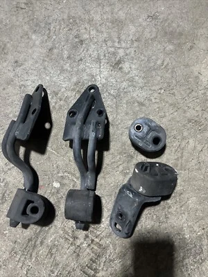 Soporte de suspensión silenciador escape trasero derecho izquierdo Nissan Infiniti G35 350Z OEM G37 2 puertas Foto 1 de 2