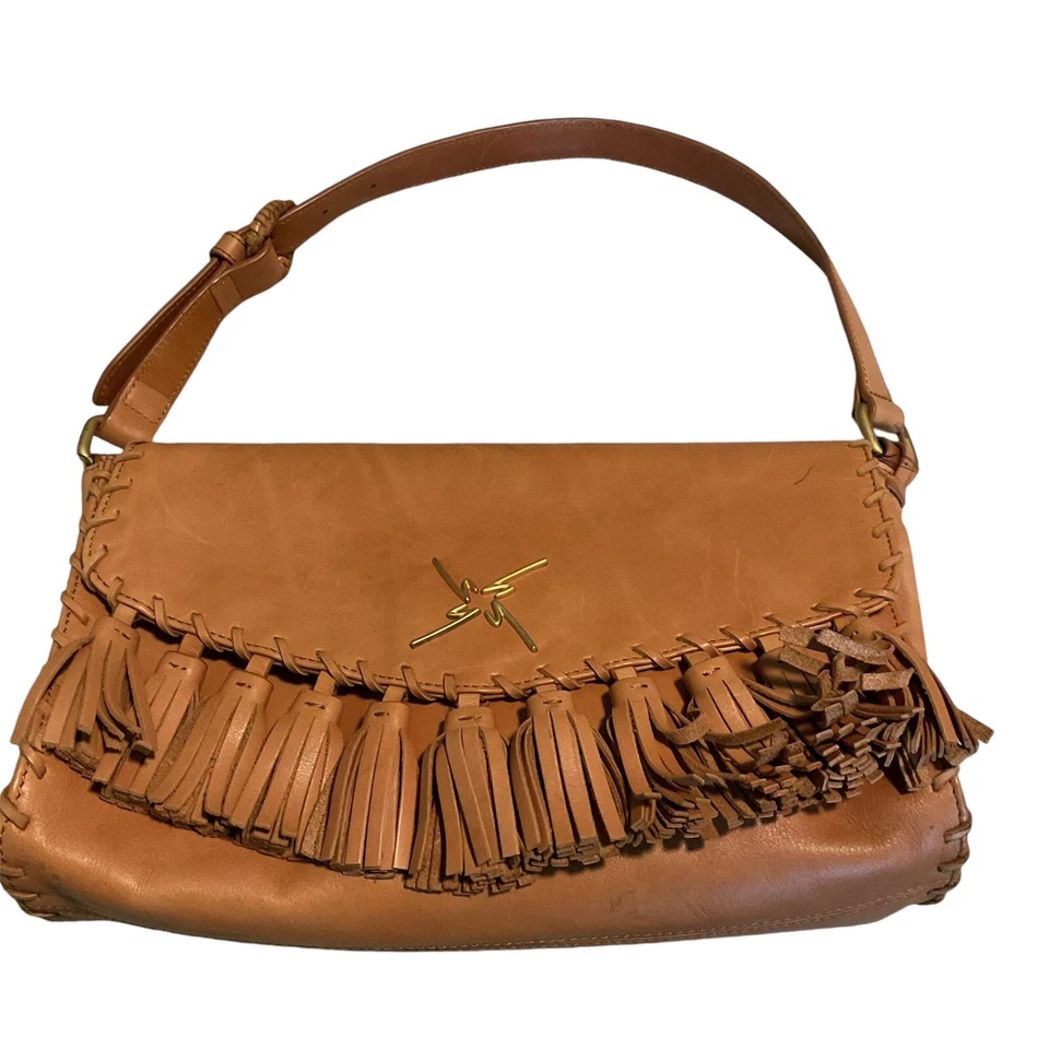 Nicole Miller Tan Leather Shoulder Purse Fringed Tassel Adjustable Straps - Image 1 of 4