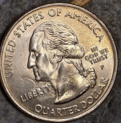 2007 P Idaho Quarter Strike Through Error Coin Defective Planchet Error - Image 1 of 4