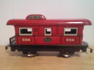 VINTAGE MARX 6" LONG #556 027 NYC CABOOSE RED WITH BLACK CHASSIS WITH 2 AXLES - Picture 1 of 6