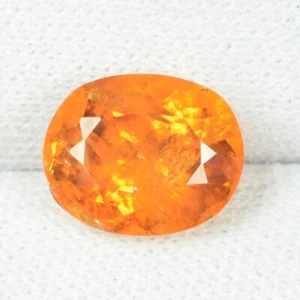 2.40 ct GORGEOUS" GLOW FIRE ORANGE 100% NATURAL CLINOHUMITE - Oval See Vdo DL - Picture 1 of 3