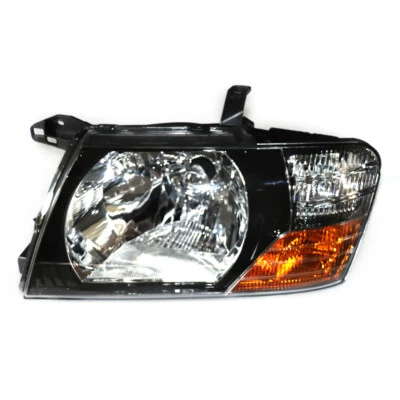 Left Headlight for 2000-2006 Mitsubishi Pajero Montero - PC Lens - Image 1 of 4