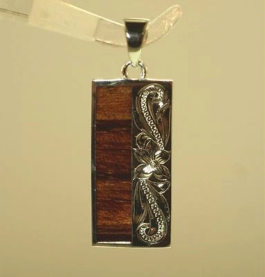 COLGANTE VERTICAL ROLLOS DE MADERA DE KOA HAWAIANO CON INCRUSTACIONES GENUINAS DE PLATA 925 MACIZA DE 12 MM Foto 1 de 4