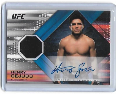 HENRY CEJUDO TRIPLE C 2019 Topps UFC Knockout Champion Dual Relic Auto Autograph - Image 1 of 2